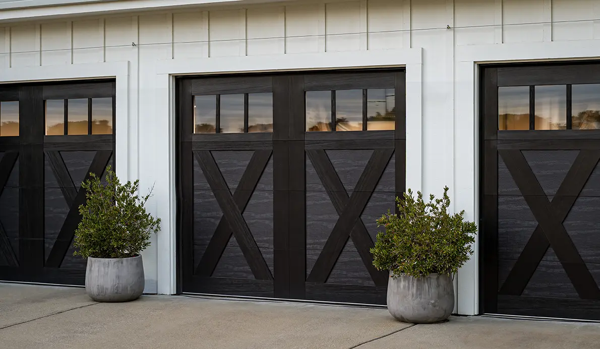Modern Clopay replacement garage doors on a residential home